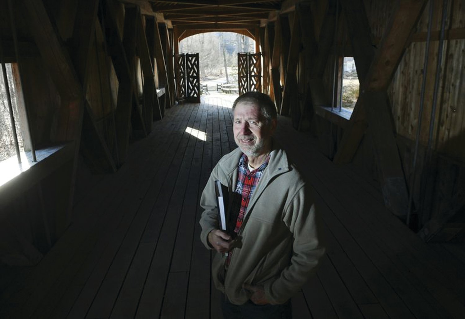 MEET THE AUTHOR: Martin Podskoch, author of “Rhode Island 39 Club” and “Rhode Island Conservation Corps Camps,” is pictured on Comstock’s Bridge in East Hampton, Connecticut.